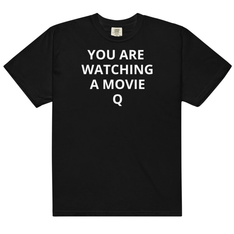 black t-shirt saying, YOU ARE WATCHING A MOVIE" - Michael J. Penney