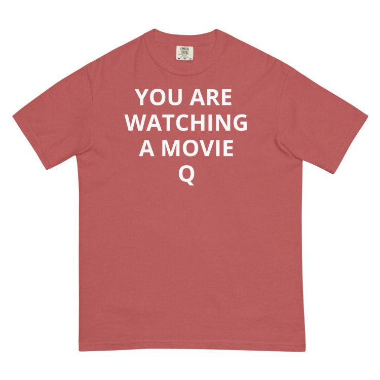 red t-shirt saying, YOU ARE WATCHING A MOVIE" - Michael J. Penney